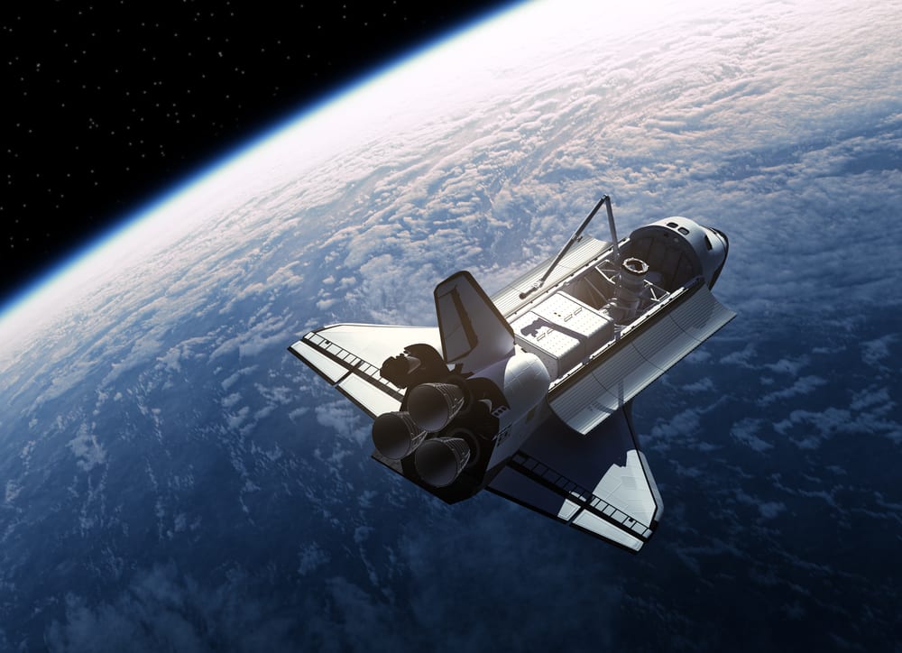 Space shuttle orbiting earth